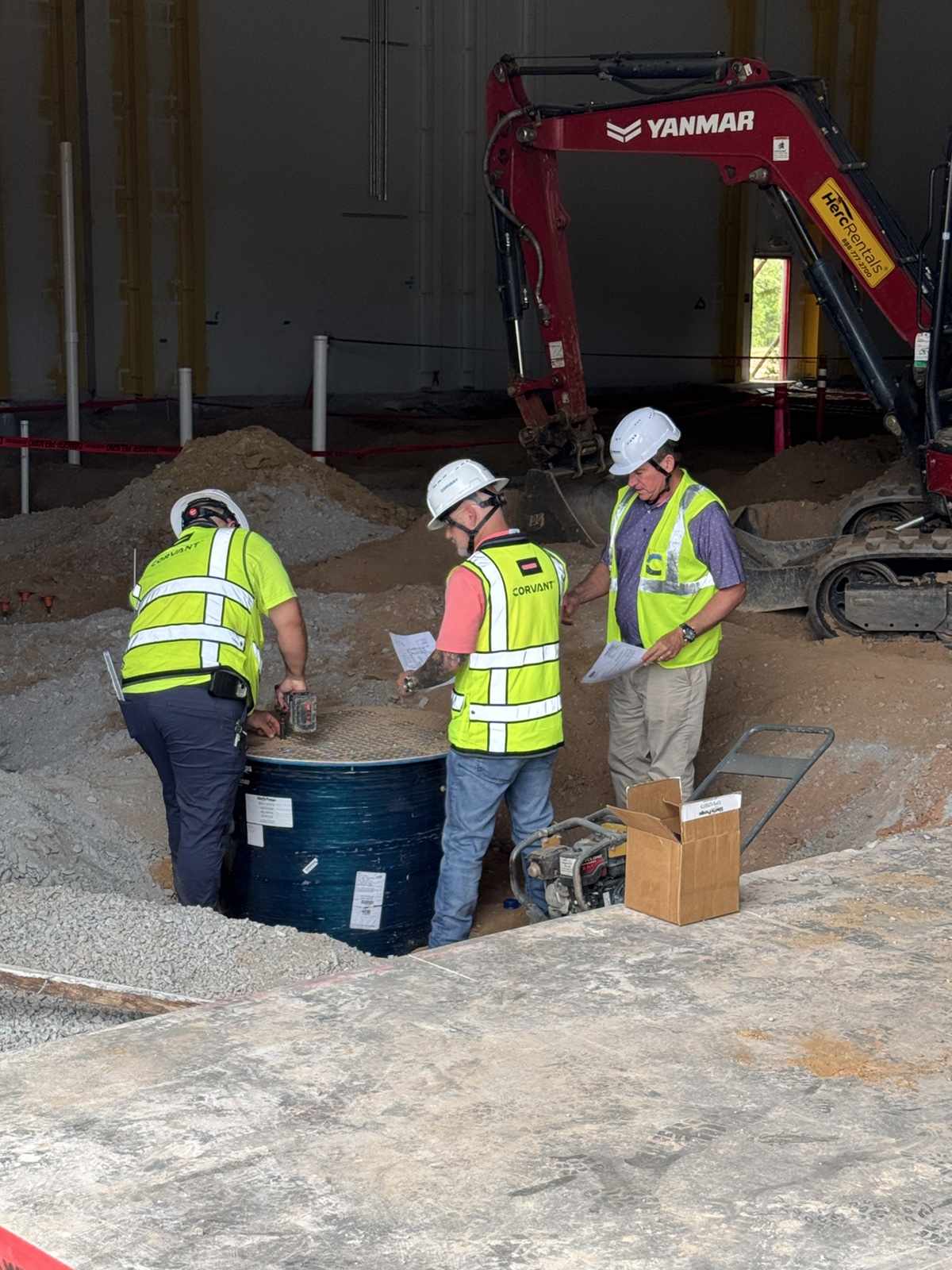 United Sales representative working with contractors at a jobsite