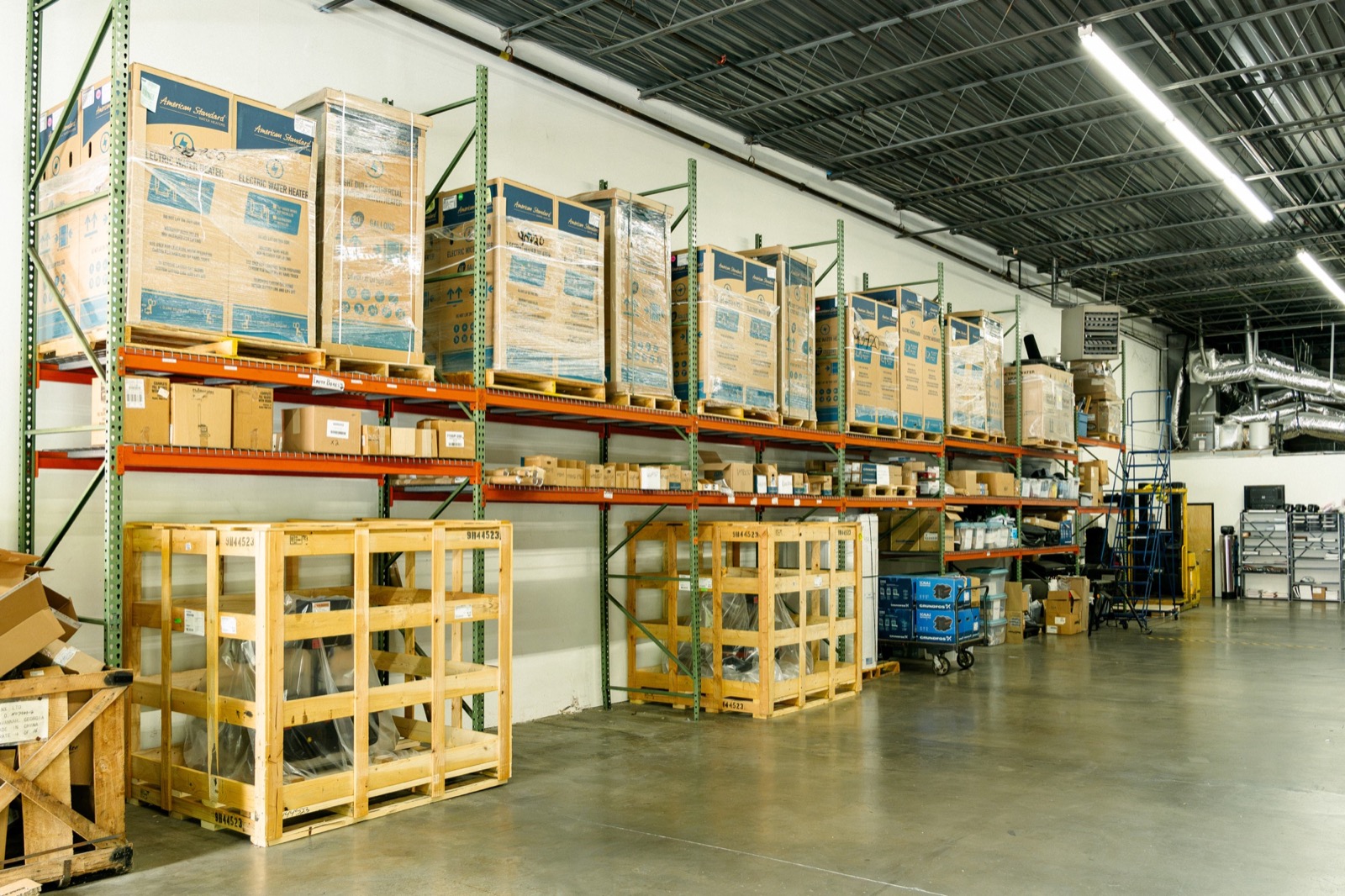 Palletized plumbing and water-heating products stored in the United Sales Agency warehouse